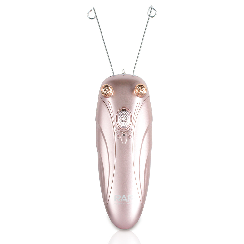Vooraanzicht van de roze RAF Epilator op een witte achtergrond, toont het stijlvolle en gebruiksvriendelijke ontwerp van het apparaat.
