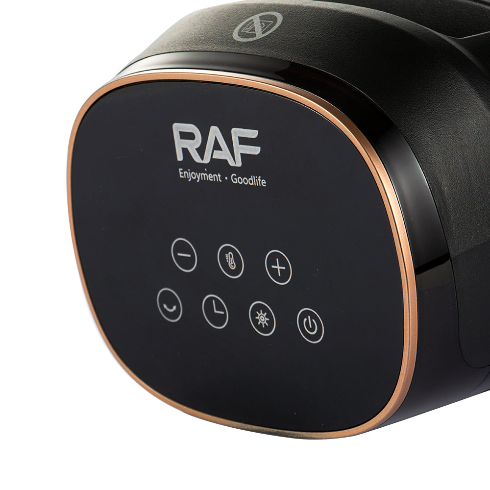 Close-up van het bedieningspaneel van de RAF ventilatorkachel met aanraakknoppen en een zwart ontwerp met gouden accenten